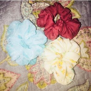 Set of teal, yellow and maroon scrunchies
